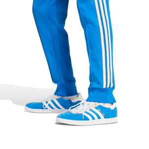 ADI REAL 25-26 ICON TRACK PANT BLUE BIRD/WHITE