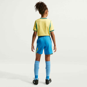 NIKE JR BRAZIL WC26 HOME SHORT PHOTO BLUE/LIGHT MENTA
