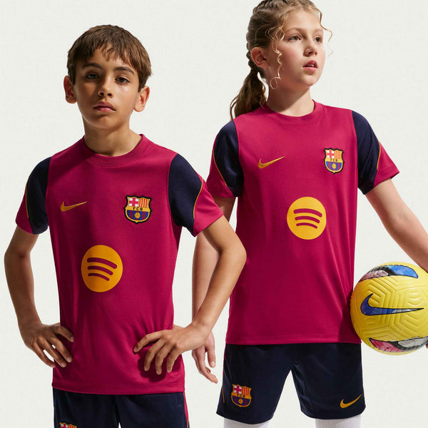 NIKE JR BARCELONA 26-27 STRIKE SS TOP NOBLE RED/MINERAL YELLOW